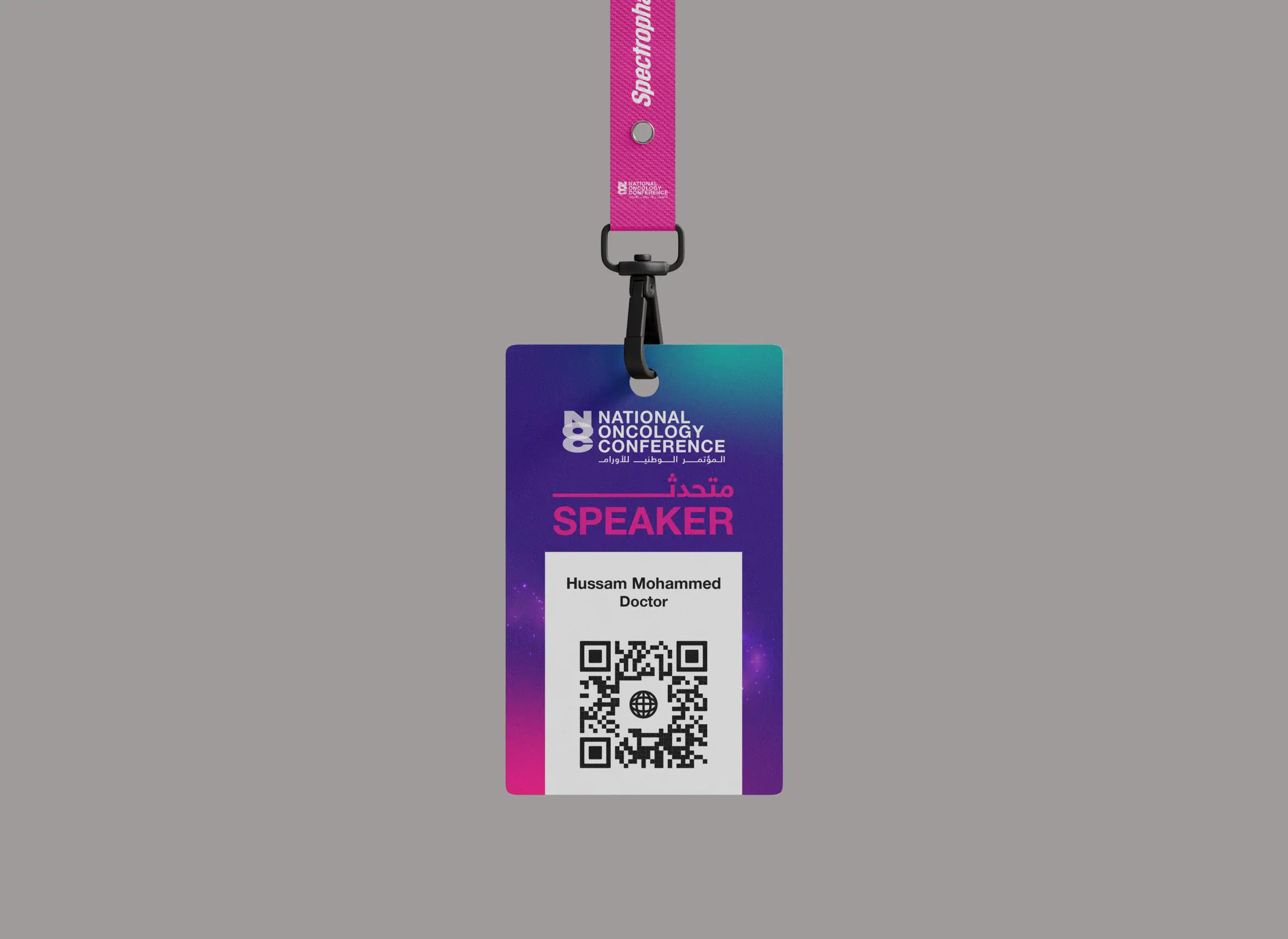 a purple and blue lanyard with a white and pink text